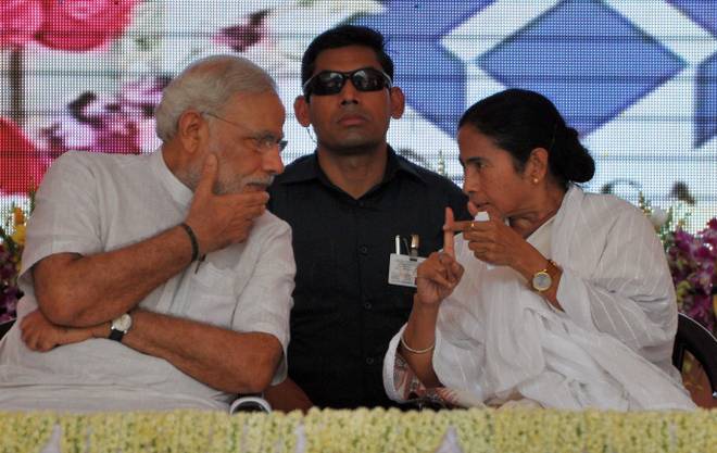 Why Mamtha Plans and then cancels her visit to attend Modi swearing in ceremony
