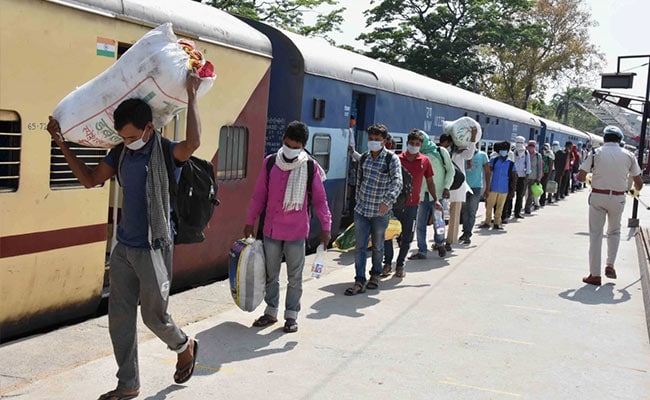 Train fare for migrant workers issue BJP bowed down Complicatedly