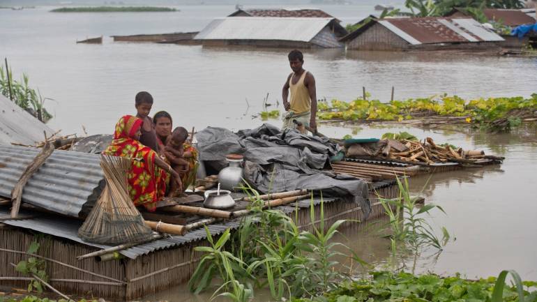 Assam Flood :  Rivers cross danger marks,  93 death , 2.8millions Assamese affected , centre govt imbibe  mercilessly