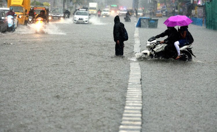 Heavy rain flooded roads halted Chennai and Suburbans