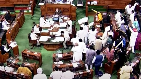 Amidst Pegasus snooping controversy pandaemonium BJP govt passes 2 bills in Lok Sabha