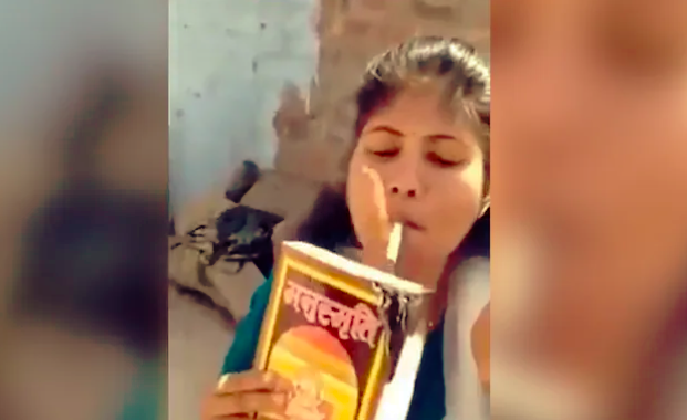 Young girl burn Manusmriti using cigarette goes viral